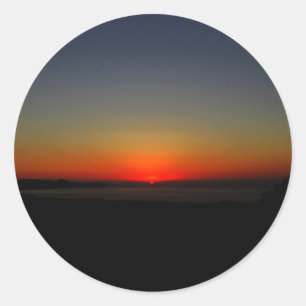 Sticker Rond Coucher de soleil dans l'eau
