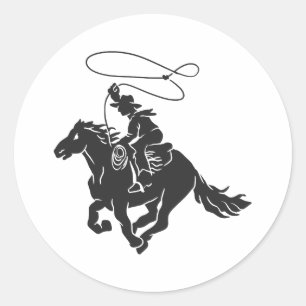 Sticker Rond Cowboy sur buccking cheval courir avec lasso