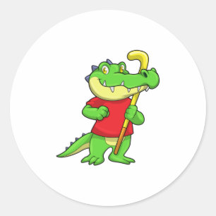 Sticker Rond Crocodile à Field hockey avec bâton