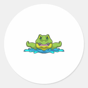 Sticker Rond Crocodile à nager dans l'eau