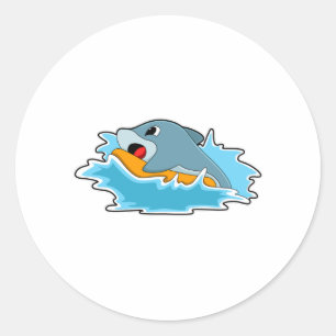 Sticker Rond Dauphin au surf avec Surfboard