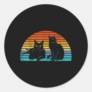 Sticker Rond Deux chats noirs fond coloré amateurs de chats