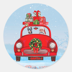 Sticker Rond Doberman Chien En Voiture Avec Le Père Noël