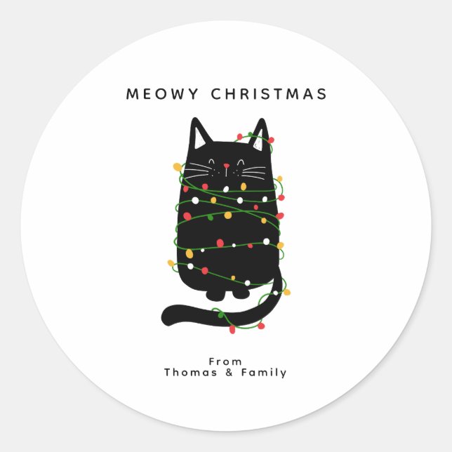 Sticker Rond Drôle Chat Noir Tangé Dans La Lumière De Noël (Devant)