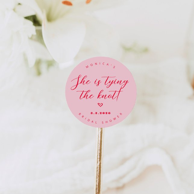 Sticker Rond Elle noue le noeud rose et rouge nuptiale (Créateur téléchargé)