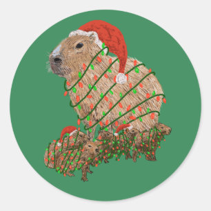 Sticker Rond Famille Capybara de Noël enrobée de lumières