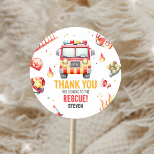 Sticker Rond Fête Baby Shower Camion de pompiers sonne l'alarme