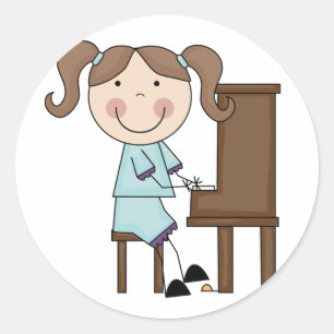 Sticker Rond Fille de bâton jouant le piano