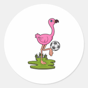 Sticker Rond Flamant rose comme joueur de football avec Soccer