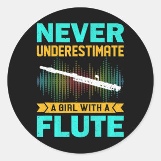 Sticker Rond Flute Ne Sous-Estime Jamais Une Fille Avec Une Flû