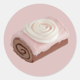 Sticker Rond Gâteau à rouleaux de chocolat avec glaçage rose