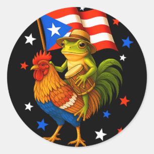 Sticker Rond Grenouille Coqui montant un poulet et tambour drap