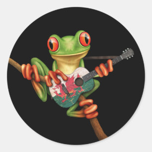 Sticker Rond Grenouille d'arbre jouant le noir de guitare de