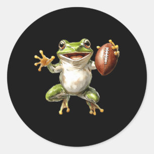 Sticker Rond Grenouille heureuse tenant un ballon de football a