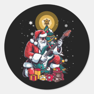 Sticker Rond Guitariste Père Noël Jouer à la guitare électrique