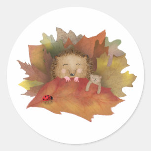 Sticker Rond Hérisson dormant dans un lit d'autocollants ronds