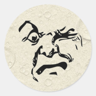 Sticker Rond Homme en colère sur la face de la Lune