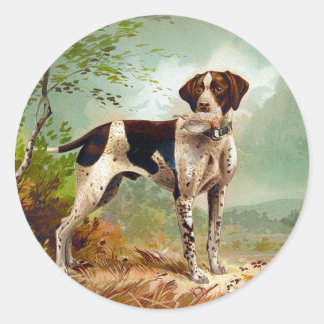 Sticker Rond Hunter dog with bird in mouth