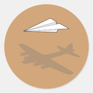 Sticker Rond Imagination suractive de l'avion en papier