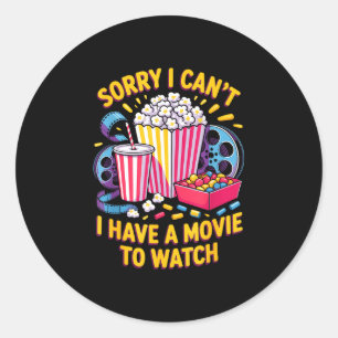 Sticker Rond Impossible de regarder un film nourriture du soir 