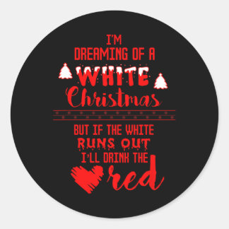 Sticker Rond Je rêve d'un Noël blanc en train de boire