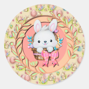 Sticker Rond Joli lapin de Pâques assis dans le panier