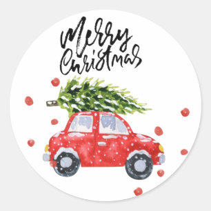 Sticker Rond Joyeuse voiture rouge de Noël avec sapin de Noël