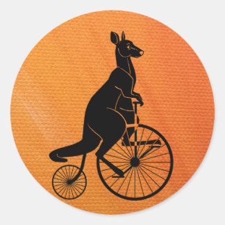 Sticker Rond Kangaroo faire du vélo