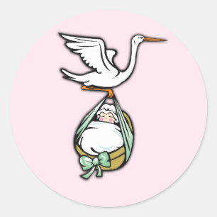 Sticker Rond La cigogne porte une petite fille