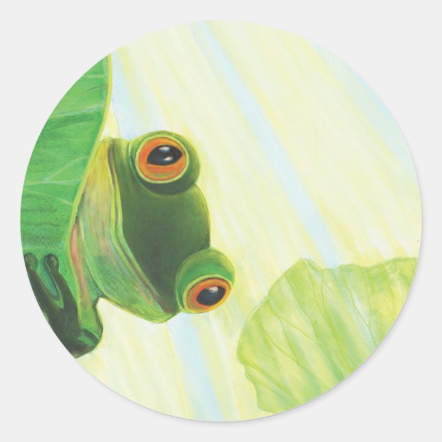 Sticker Rond La grenouille verte aux gros yeux derrière le pavé (Devant)