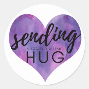 Sticker Rond Le coeur pourpre envoie un câlin socialement éloig