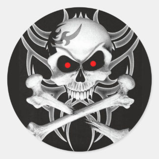 Sticker Rond Le crâne et les os croisés de la mort