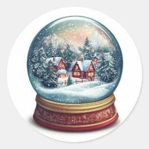 Sticker Rond Le globe de neige de Noël avec un design de villag