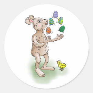 Sticker Rond Le lapin de Pâques jongle avec les oeufs de Pâques