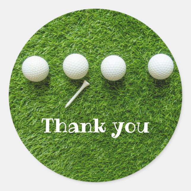 Sticker Rond Les balles de golf sont sur l'herbe verte merci (Devant)