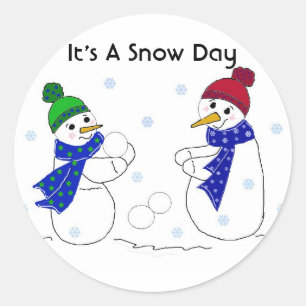 Sticker Rond Les neigeurs jouent dans la neige