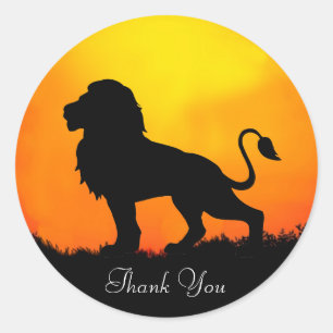 Sticker Rond Lion sauvage & lever de soleil sur une jungle Merc