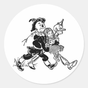 Sticker Rond Magicien vintage d'Oz Dorothy dormant avec des pav