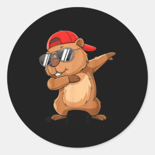 Sticker Rond Marmotte Hip-Hop faisant le dab avec une casquette