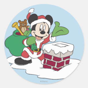 Sticker Rond Mickey en Père Noël descendant la cheminée