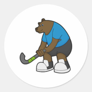 Sticker Rond Ours au hockey avec bâton de hockey