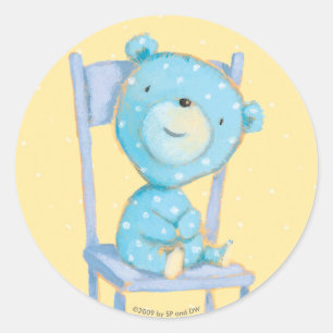 Sticker Rond Ours bleu de calicot souriant sur la chaise