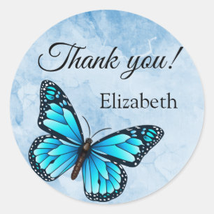 Sticker Rond Papillon bleu élégant
