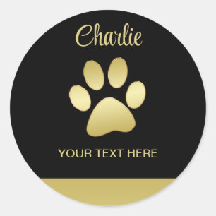 Sticker Rond Paw chien brillant or sur arrière - plan noir