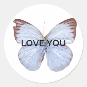 Sticker Rond pegatina La mariposa, anuncia las flores y el amor
