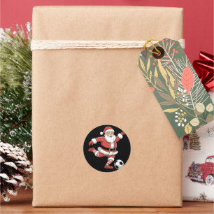 Sticker Rond Père Noël joue au football Noël Sports