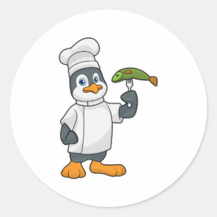 Sticker Rond Pingouin à cuire avec tablier de poisson et de Cui