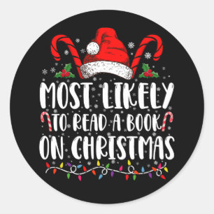 Sticker Rond Plus susceptible de lire un livre à Noël