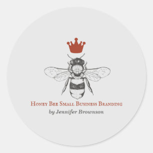 Sticker Rond Reine abeille couronne en nid d'abeille grise roug