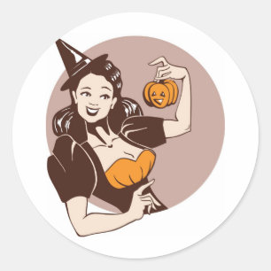 Sticker Rond rire jolie fille en costume de sorcière avec pumpk